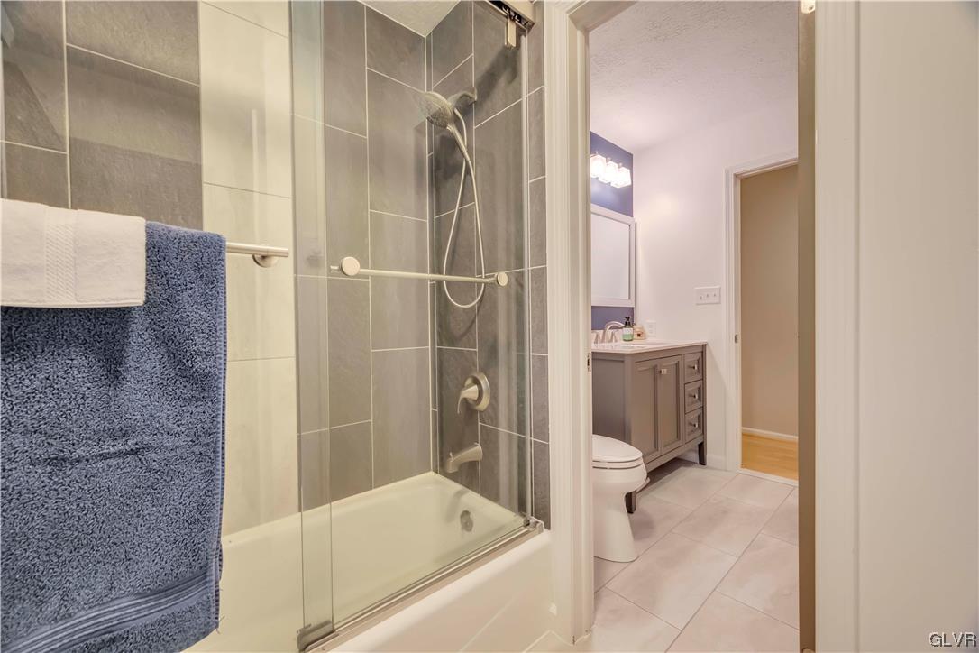 2559 Mountain Road Slatington, PA 18080 - Photo 17 of 32 a bathroom with a tub and a shower
