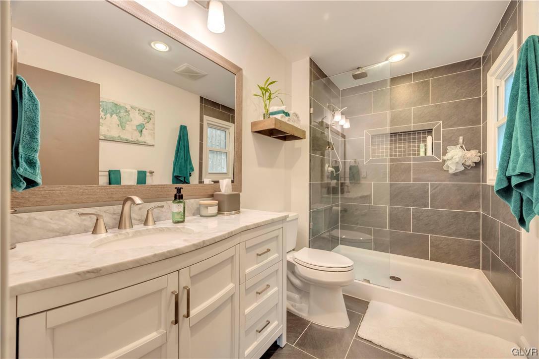 2559 Mountain Road Slatington, PA 18080 - Photo 19 of 32 a bathroom with a sink a toilet and shower