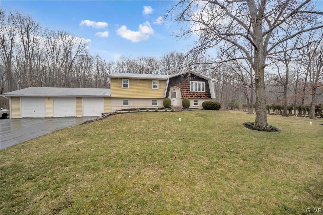 2559 Mountain Road Slatington, PA 18080 - Photo 29 of 32 a large house with a large tree in front of it