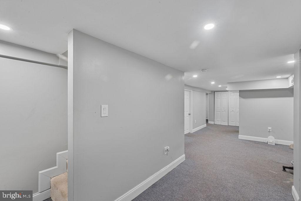 8489 Arbutus Road Pasadena, MD 21122 - Photo 14 of 41 a view of a hallway