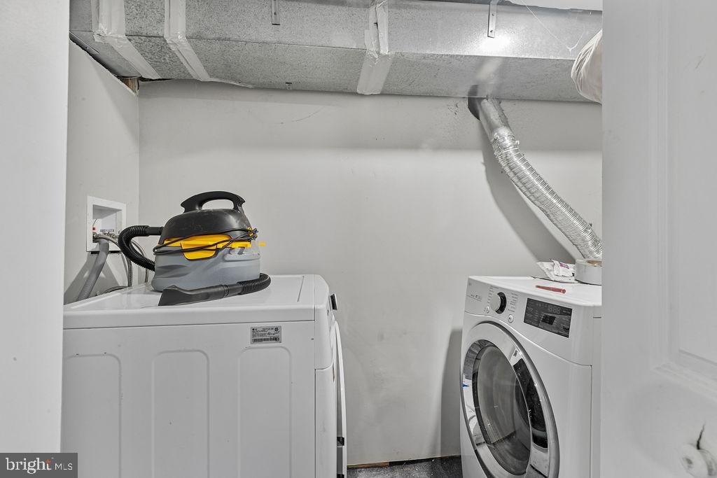 8489 Arbutus Road Pasadena, MD 21122 - Photo 35 of 41 a utility room with dryer and washer