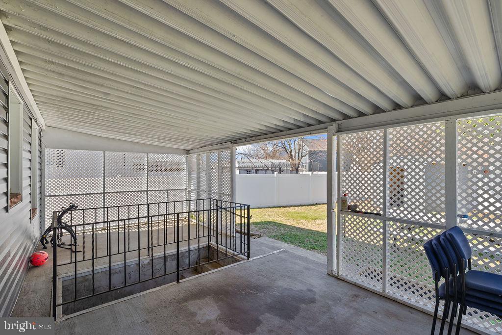 8489 Arbutus Road Pasadena, MD 21122 - Photo 37 of 41 a view of a backyard