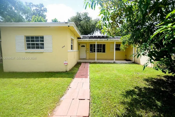 a view of a back yard of the house