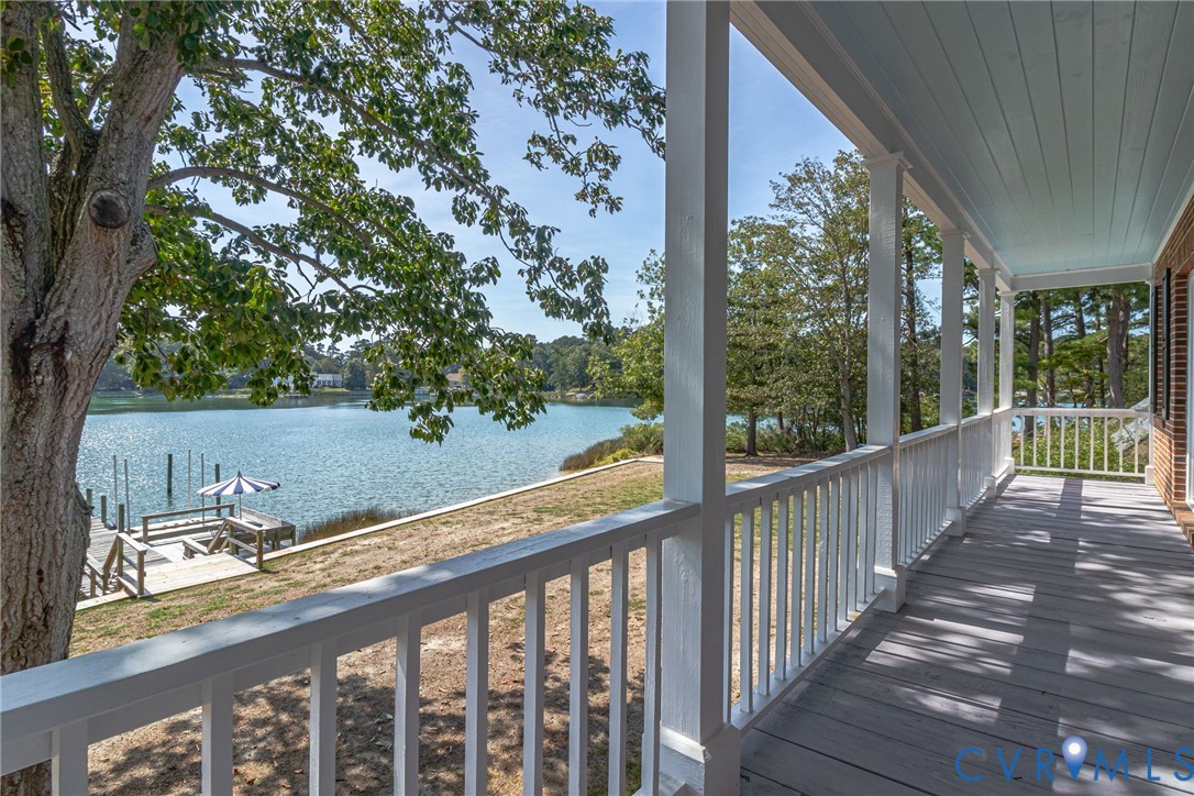 430 Harveys Neck Road Heathsville, VA 22473 - Photo 33 of 51 Expansive waterfront porch featuring a pale blue p