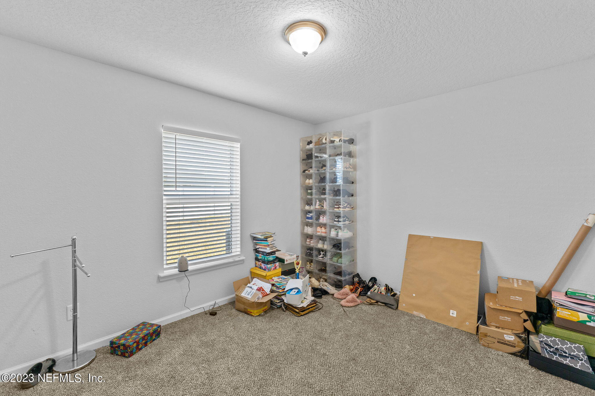 1592 Liberty Tree Place Jacksonville, FL 32221 - Photo 19 of 28 a view of a room with gym equipment