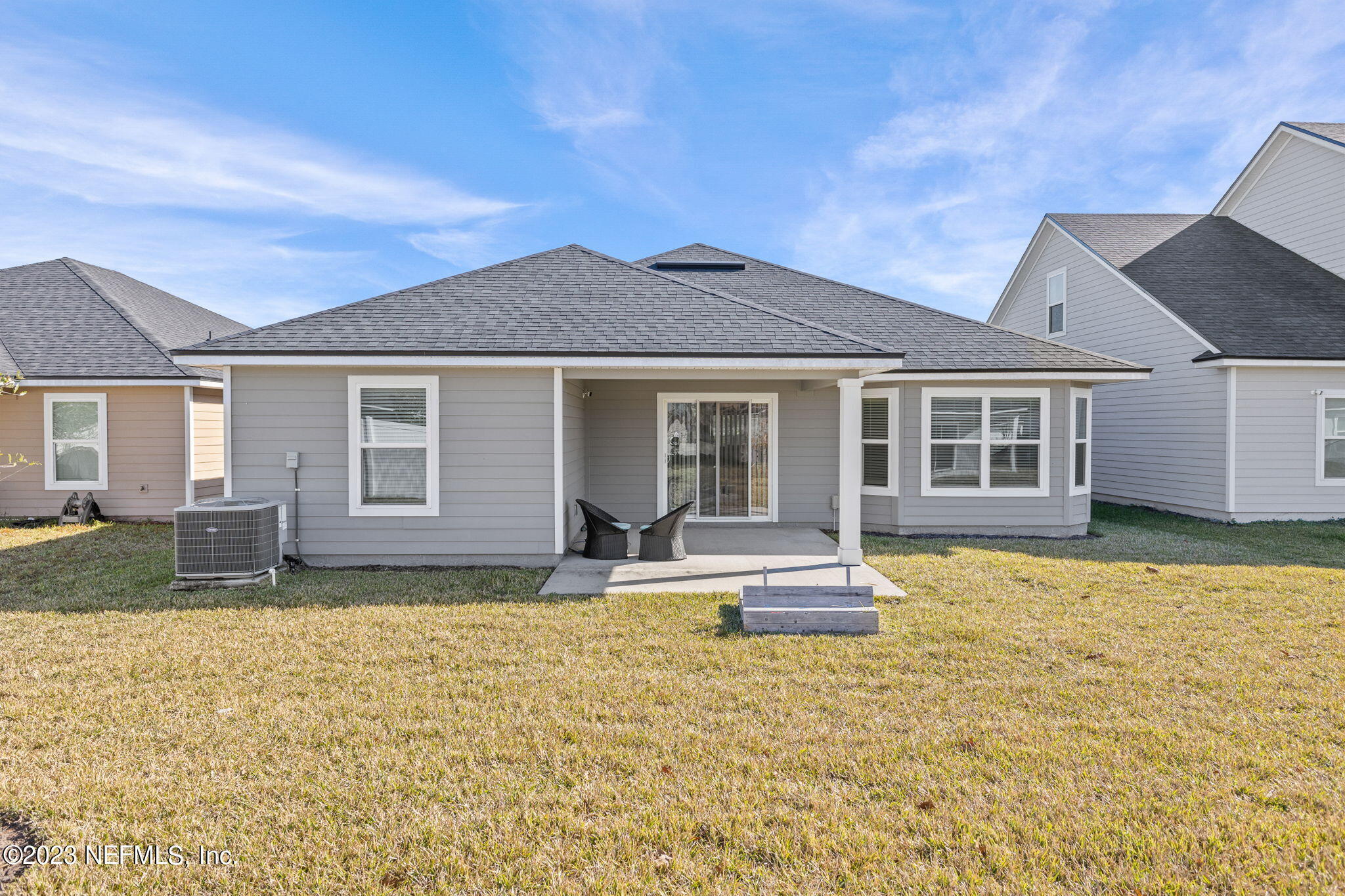 1592 Liberty Tree Place Jacksonville, FL 32221 - Photo 22 of 28 a front view of a house with a yard