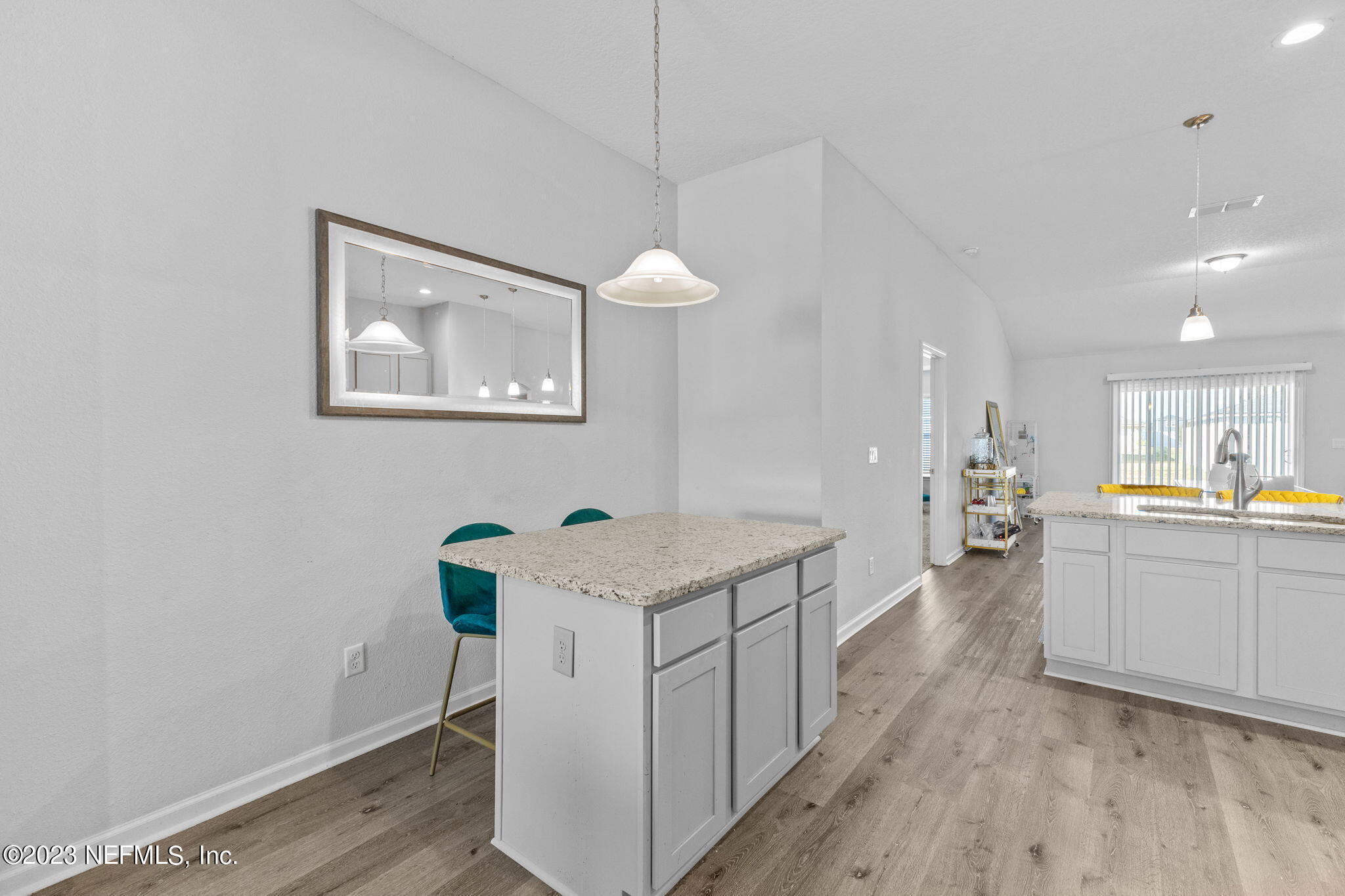 1592 Liberty Tree Place Jacksonville, FL 32221 - Photo 6 of 28 a kitchen with a sink stove and cabinets