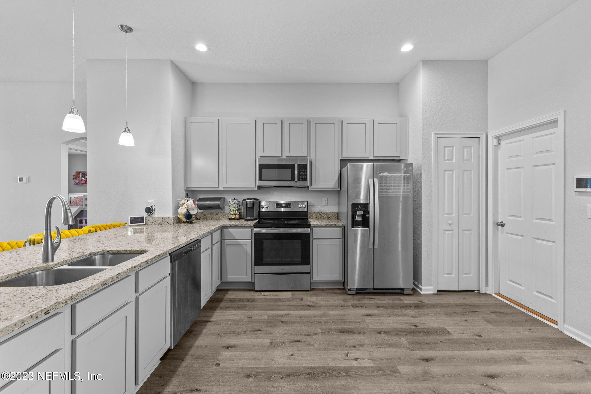1592 Liberty Tree Place Jacksonville, FL 32221 - Photo 8 of 28 a kitchen with a sink appliances and cabinets