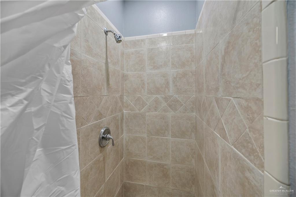3107 South 6th Lane McAllen, TX 78503 - Photo 24 of 31 a bathroom with a shower
