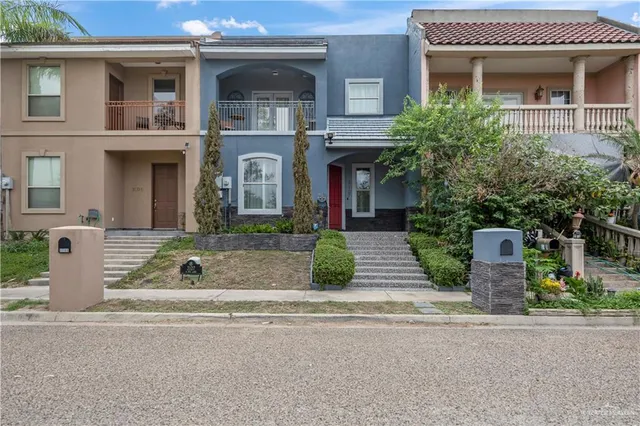 a view of a livingroom with furniture and a flat screen tv