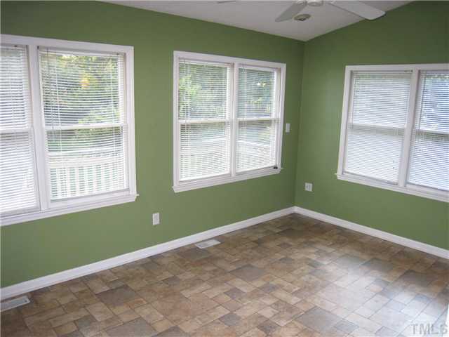 3505 East Jameson Road Raleigh, NC 27604 - Photo 7 of 14 Beautiful Sunroom with expansive view of large fenced back yard