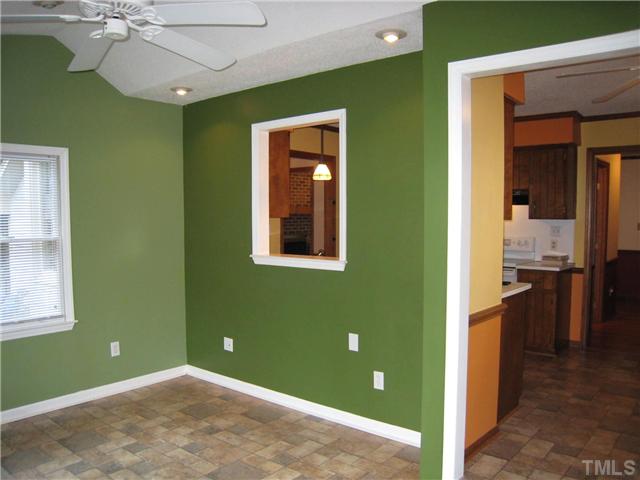 3505 East Jameson Road Raleigh, NC 27604 - Photo 8 of 14 Sun Room with window sized opening to the kitchen
