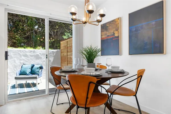 a view of a dining room with furniture window and outside view