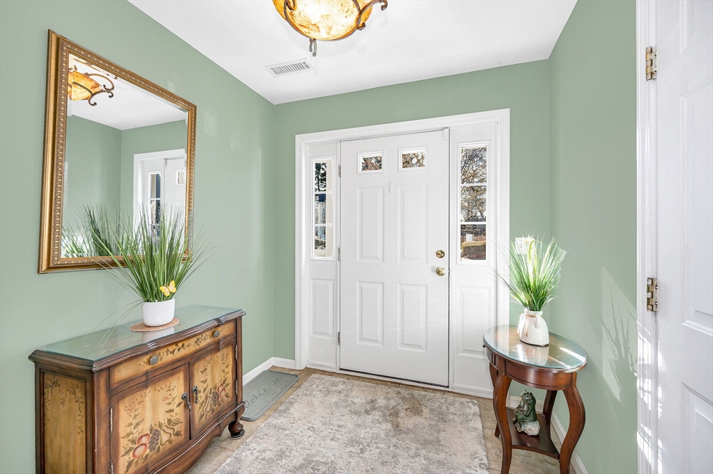 262 Littleton Road, Unit 14 Chelmsford, MA 01824 - Photo 4 of 30 a view of a hallway and dining room