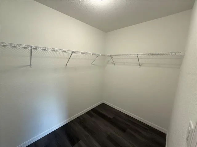 a view of a room with racks on the wall