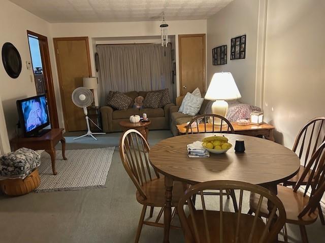 555 Marion Street Creighton, PA 15030 - Photo 5 of 7 a view of a dining room with furniture and wooden floor