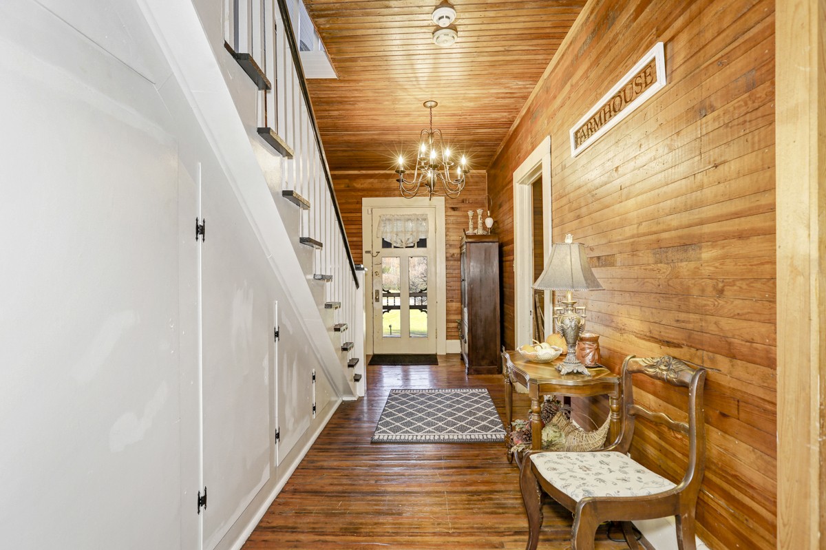27 Bee Spring Road Dellrose, TN 38453 - Photo 5 of 30 a view of a hallway with wooden floor and entryway