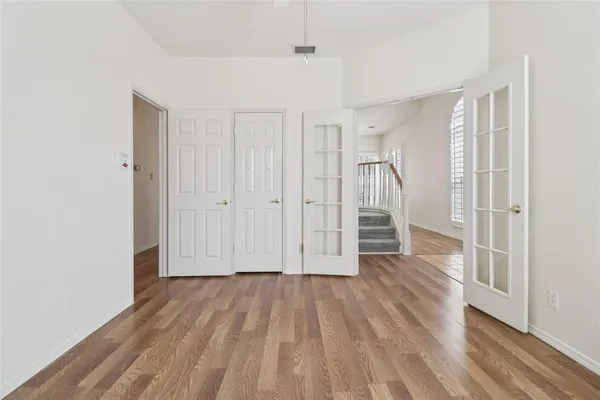 a view of entryway with wooden floor