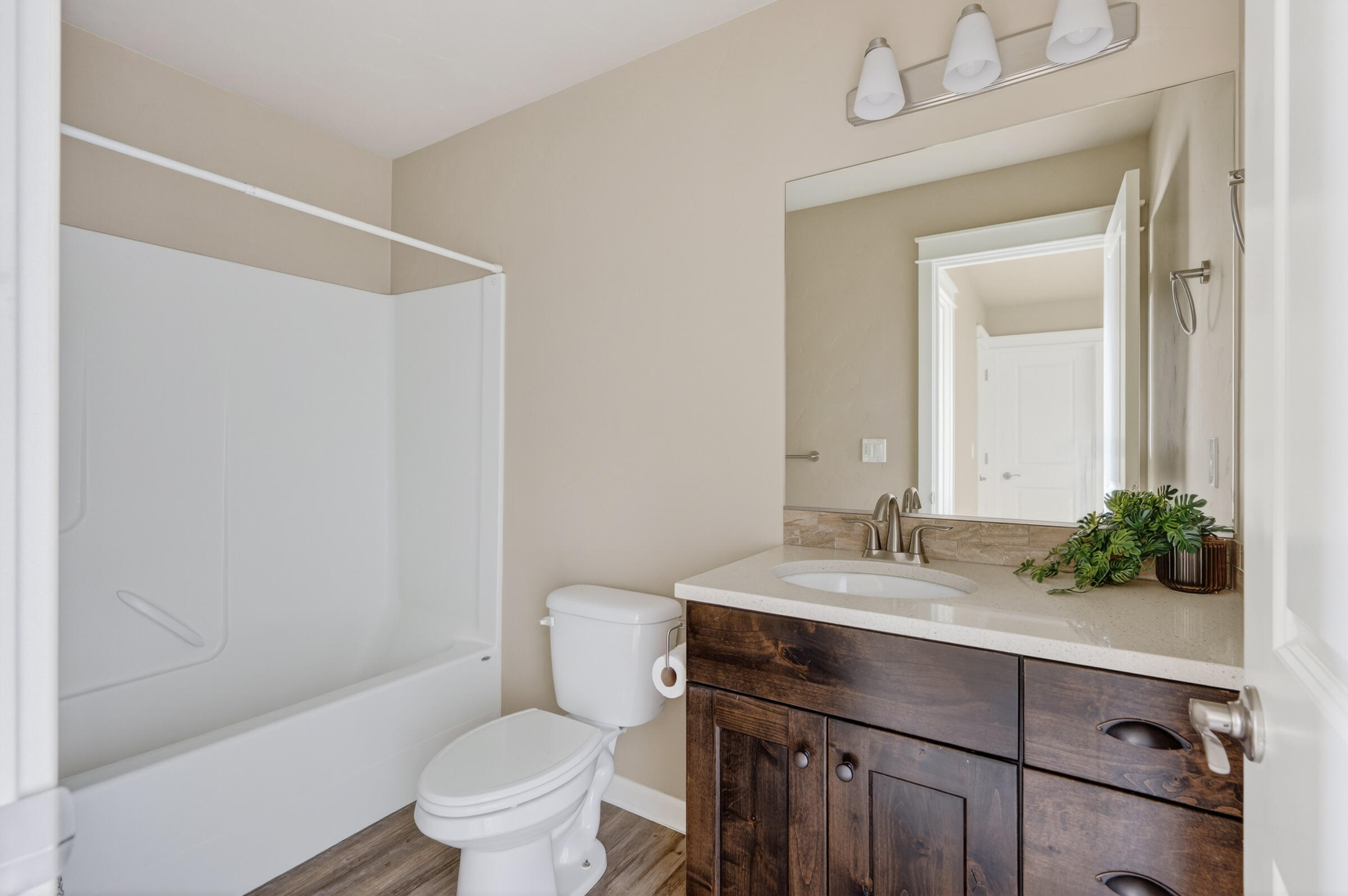 3365 Southwest 28th Street Redmond, OR 97756 - Photo 23 of 39 a bathroom with a sink vanity mirror and toilet