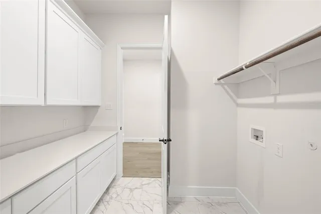 a bathroom with a bathtub and a sink