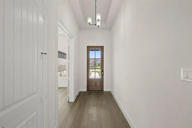 a view of a hallway with entryway