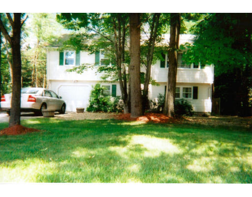 18 Rickey Drive Maynard, MA 01754 - Photo 1 of 9 a view of backyard with a garden and entertaining space