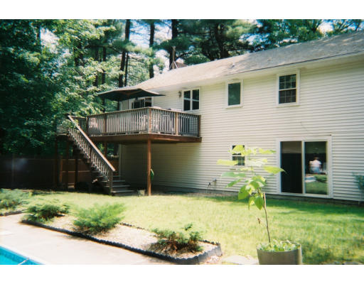 18 Rickey Drive Maynard, MA 01754 - Photo 4 of 9 a house view with a garden space