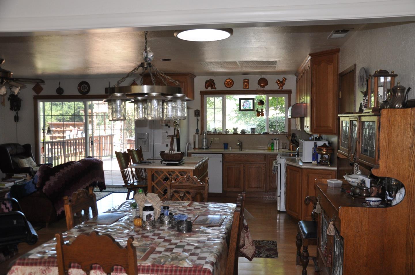 8835 Burchell Road Gilroy, CA 95020 - Photo 2 of 17 a view of a dining room with furniture window and outside view