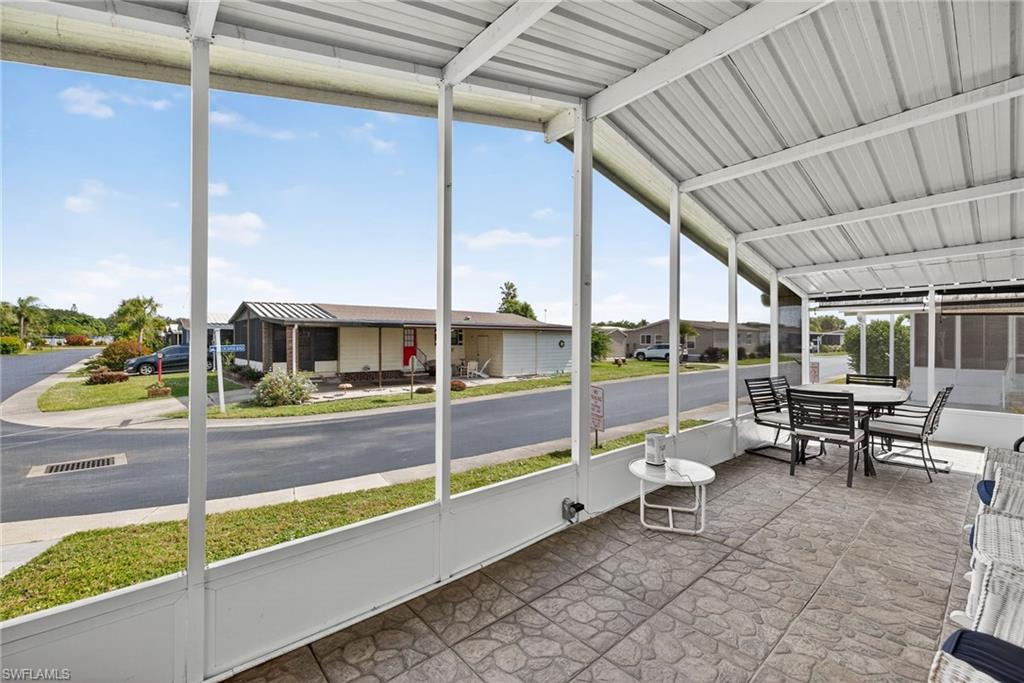 170 Oceans Boulevard, Unit 170 Naples, FL 34104 - Photo 21 of 36 a living room with couch