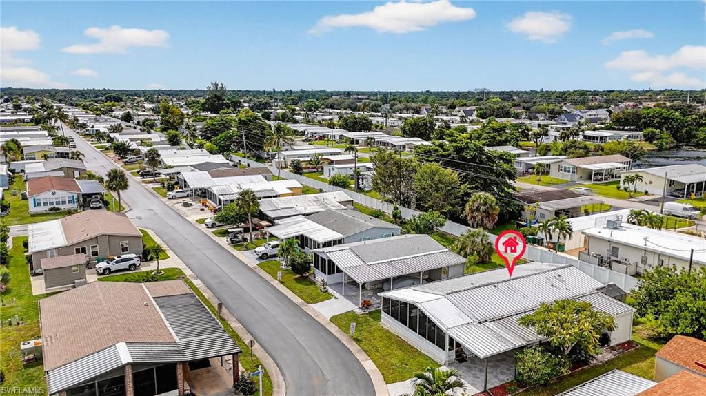 170 Oceans Boulevard, Unit 170 Naples, FL 34104 - Photo 26 of 36 an aerial view of residential houses with outdoor space