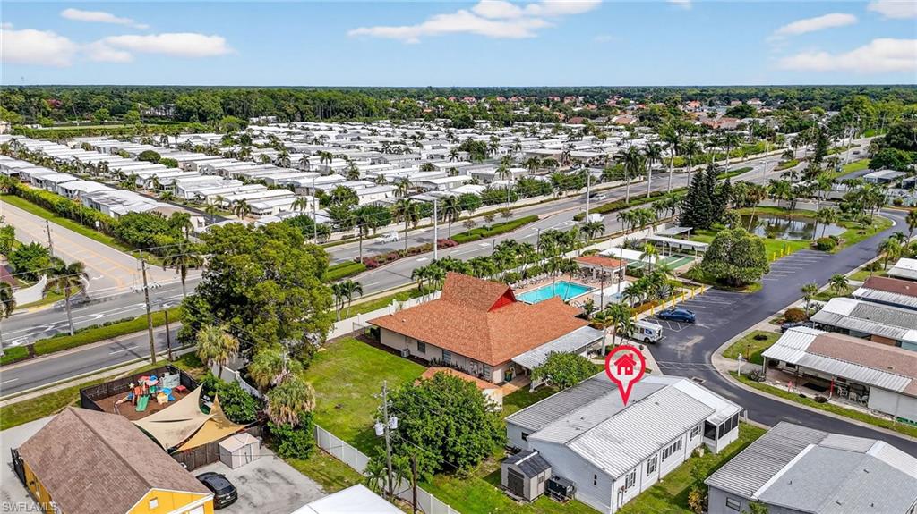 170 Oceans Boulevard, Unit 170 Naples, FL 34104 - Photo 28 of 36 an aerial view of residential houses with outdoor space