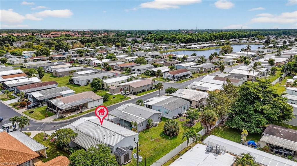 170 Oceans Boulevard, Unit 170 Naples, FL 34104 - Photo 29 of 36 an aerial view of residential houses with outdoor space