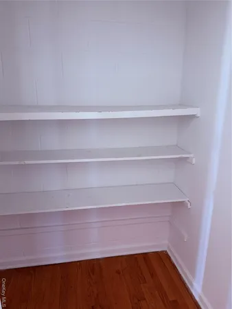 a view of small space with racks on the wall