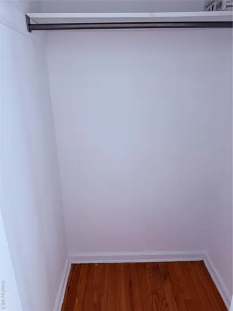 a view of a room with racks on the wall