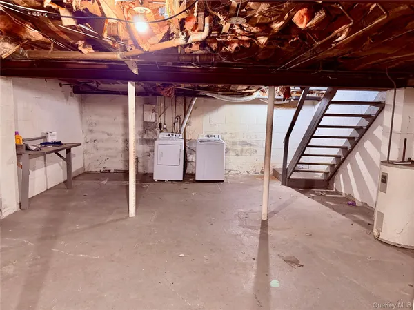 a view of a room with wooden walls