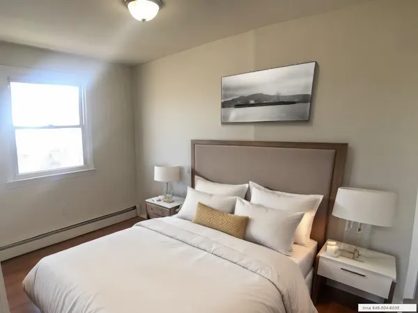 a bedroom with a bed and window