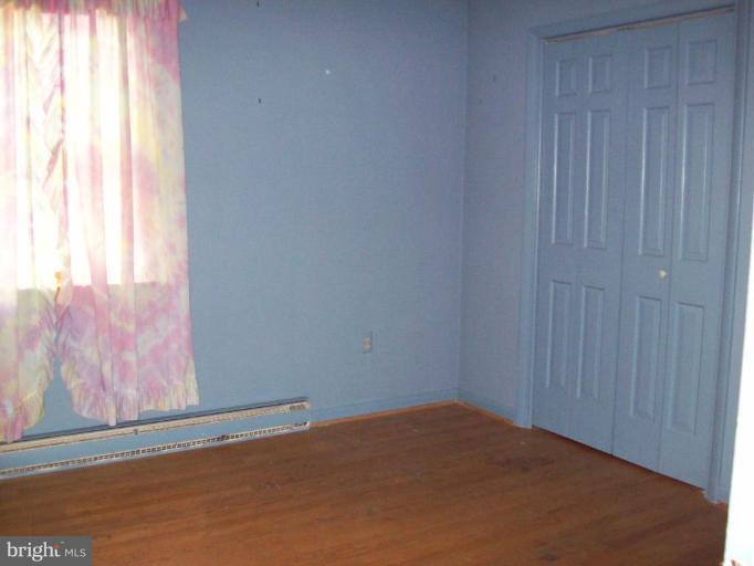 5025 Old Quarter Road Upperco, MD 21155 - Photo 1 of 18 a view of an empty room and window