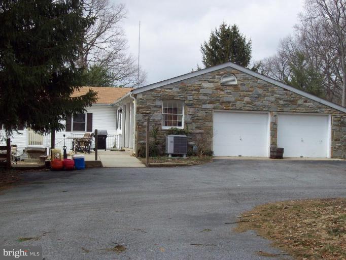 5025 Old Quarter Road Upperco, MD 21155 - Photo 12 of 18 a view of car parked in front of house