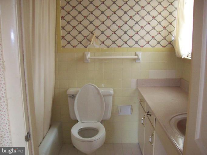 5025 Old Quarter Road Upperco, MD 21155 - Photo 16 of 18 a bathroom with a sink and a toilet