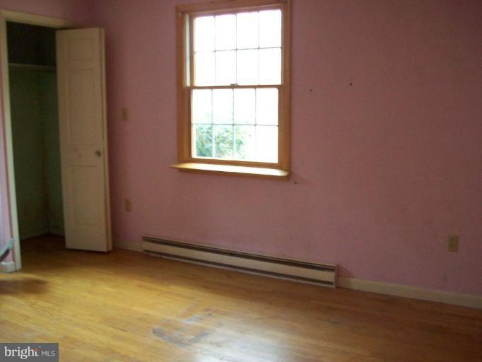 5025 Old Quarter Road Upperco, MD 21155 - Photo 3 of 18 an empty room with a window