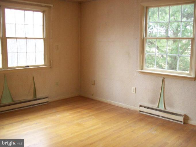 5025 Old Quarter Road Upperco, MD 21155 - Photo 10 of 18 a view of an empty room with a window