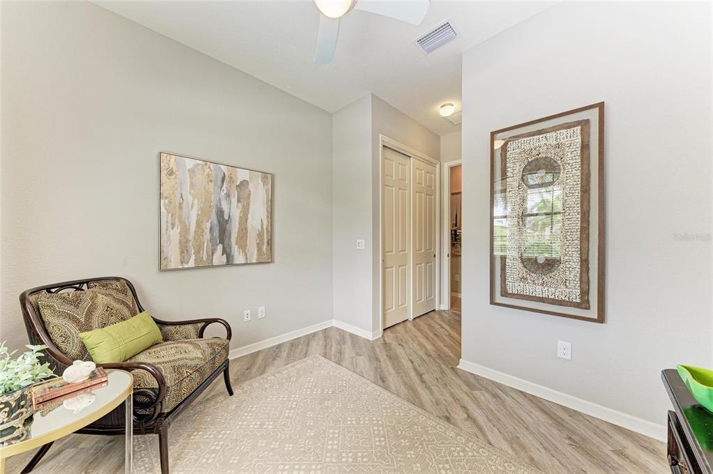 13117 Ramblewood Trail Lakewood Ranch, FL 34211 - Photo 39 of 76 a bedroom with furniture and a window