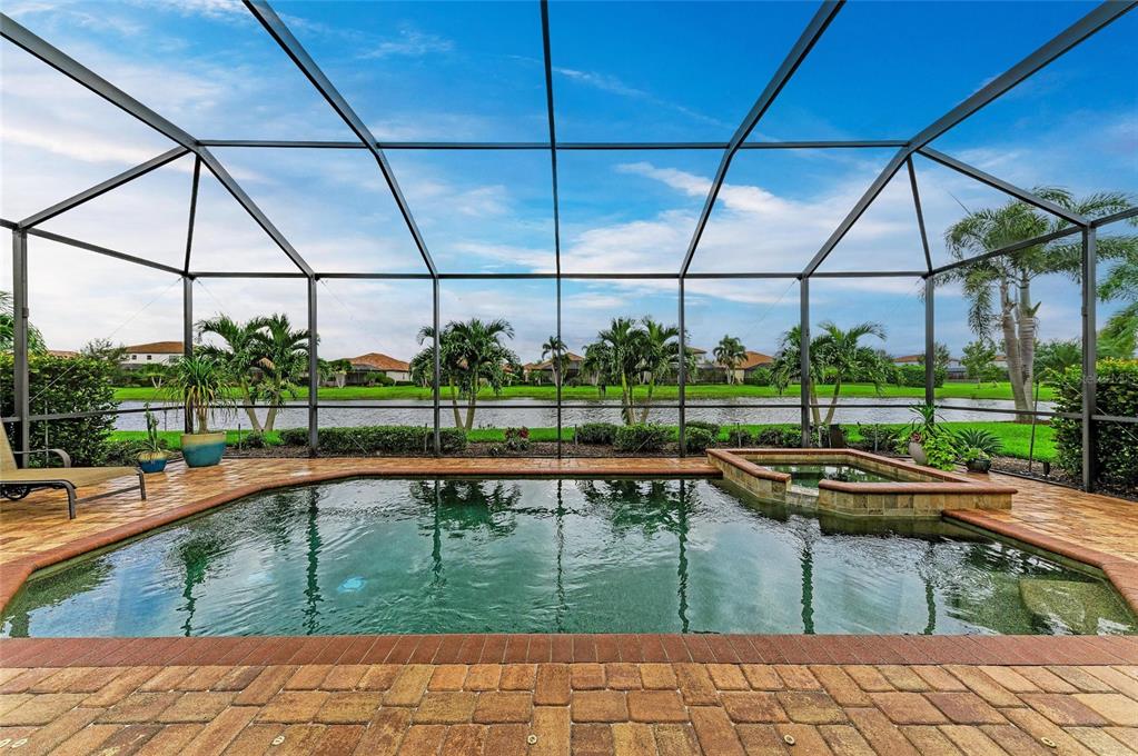 13117 Ramblewood Trail Lakewood Ranch, FL 34211 - Photo 50 of 76 a view of a swimming pool with a porch