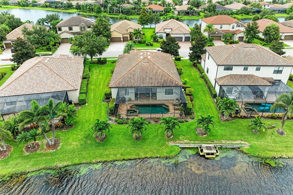 13117 Ramblewood Trail Lakewood Ranch, FL 34211 - Photo 59 of 76 an aerial view of a house with garden space and street view