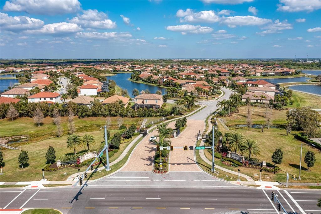 13117 Ramblewood Trail Lakewood Ranch, FL 34211 - Photo 61 of 76 an aerial view of residential building and ocean view