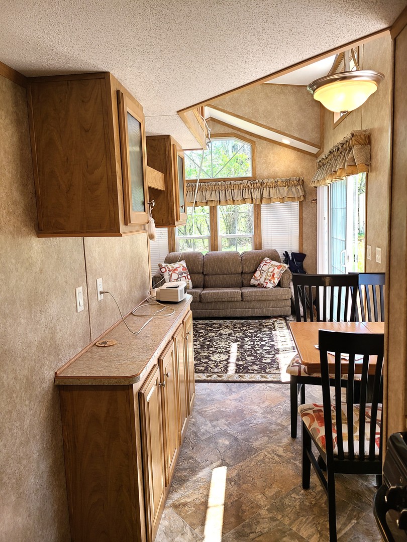 21-80 Woodhaven Sublette, IL 61367 - Photo 12 of 21 a living room with furniture and a large window
