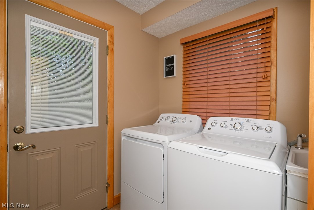 2873 Lodge Road Southwest Sherrodsville, OH 44675 - Photo 29 of 50 The laundry room is conveniently located on the main floor.