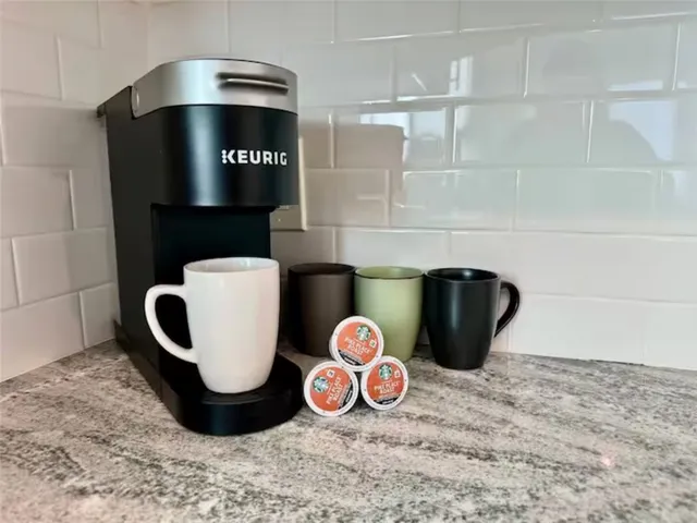 a bathroom with a mirror and a shower