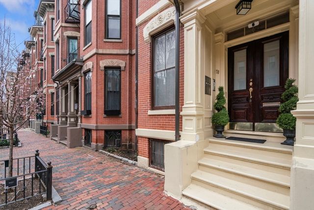 a view of a building with a window and door