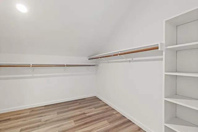a view of an empty walk in closet